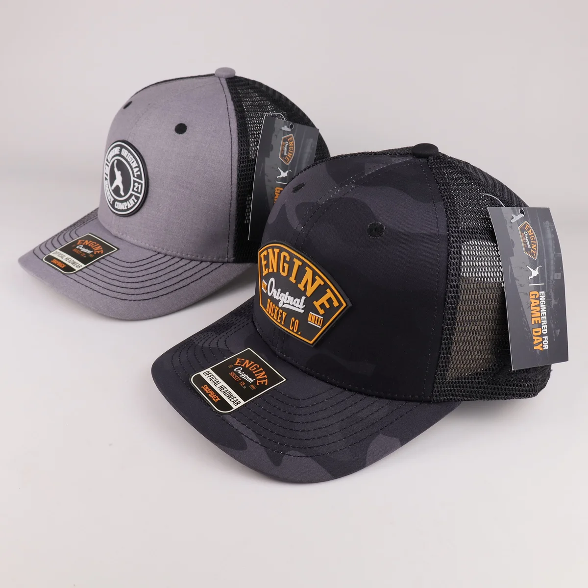 Grey and dark patch trucker cap references with separate hangtags